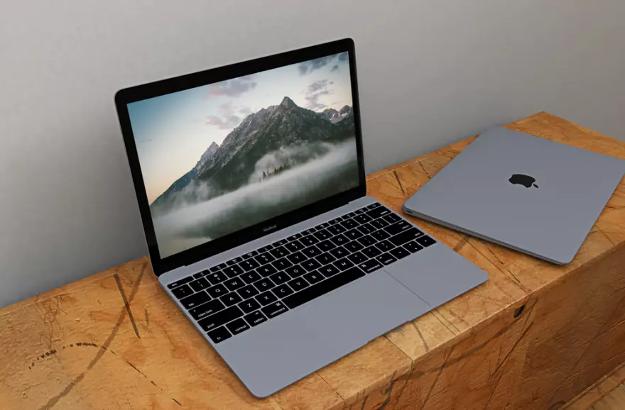 Скачать MacBook on a wooden surface