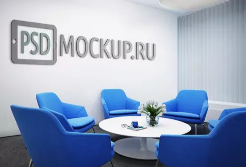 Мокап логотипа на стене офиса с синими креслами